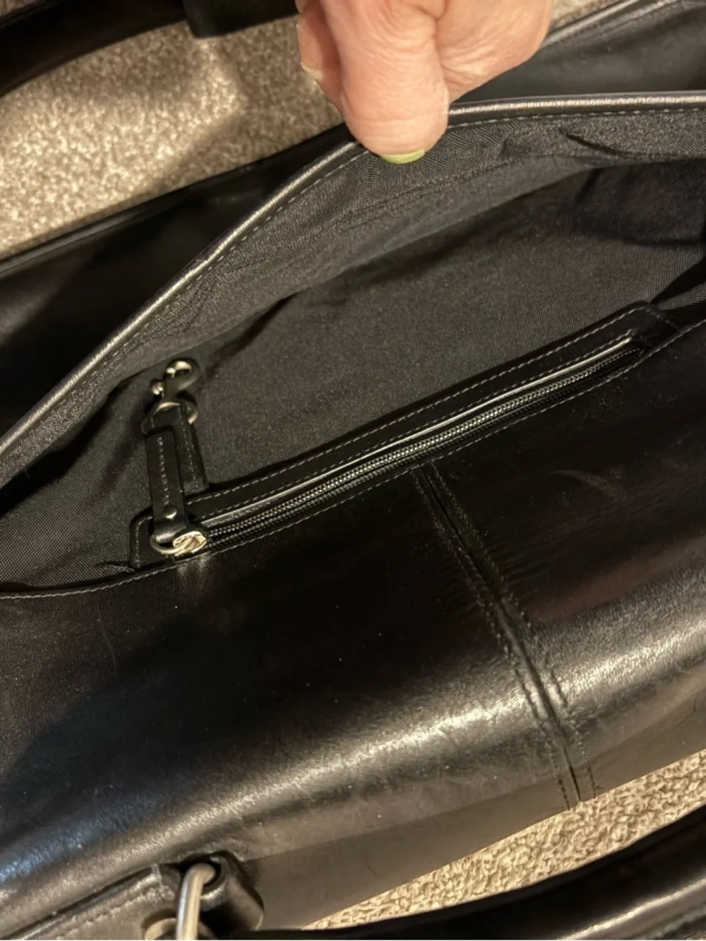 Coach sleek black